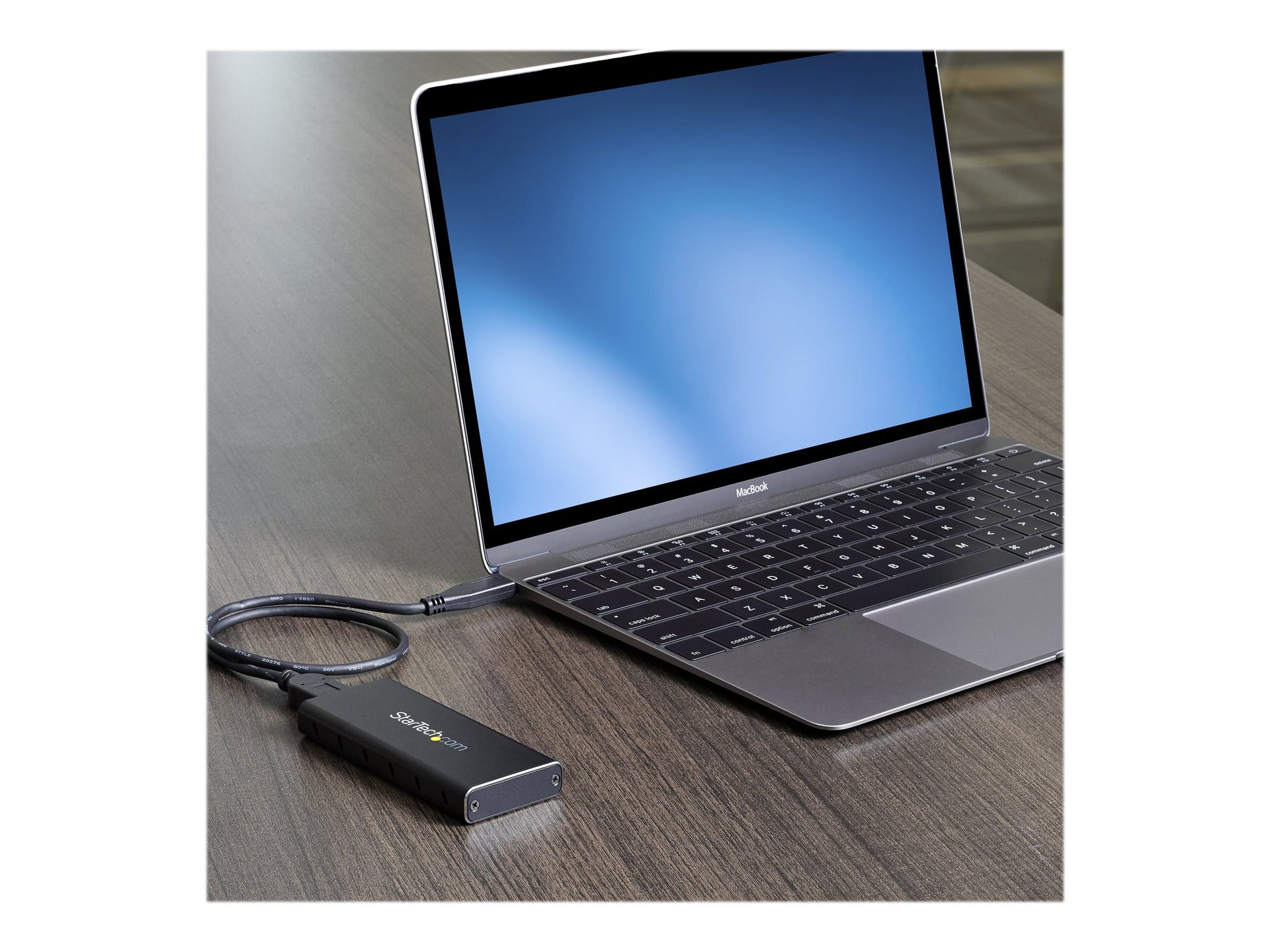 StarTech.com Caja Adaptador M.2 NGFF a USB 3.1 con Carcasa Protectora - Caja de SSD M.2 para SSDs M.2 SATA (SM21BMU31C3) - Caja de almacenamiento - M.2 - SATA 6Gb/s - USB 3.1 (Gen 2) - negro, plata - para P/N: TBLT3MM1MA, TBLT3MM2M, TBLT3MM2MA